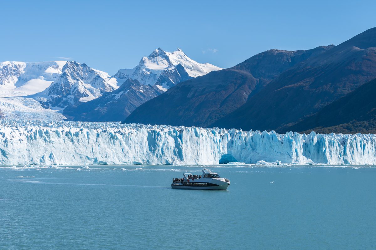 Ferry,Boat,In,Front,Of,Perito,Moreno,Glacier,,Blue,Ice Ferry,Boat,In,Front,Of,Perito,Moreno,Glacier,,Blue,Ice